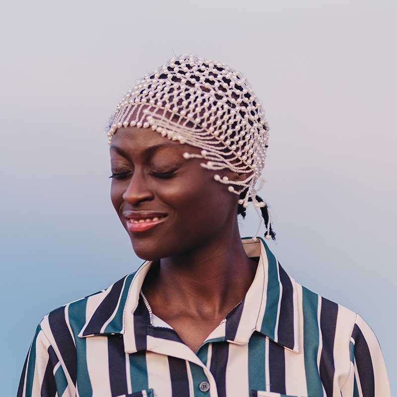 portrait of an african woman smiling 8LRBATX